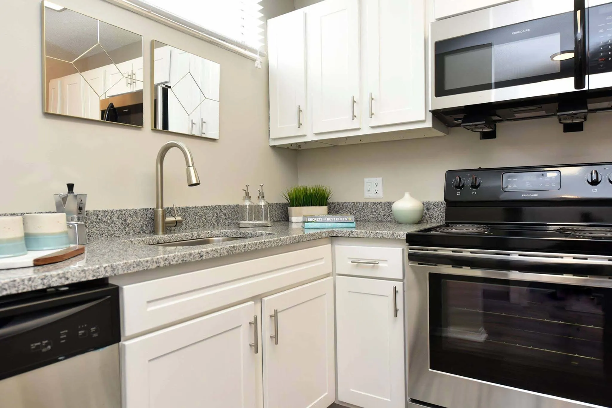 Energy Efficient Stainless Steel Microwave, Refrigerator, & Range in each apartment homes.