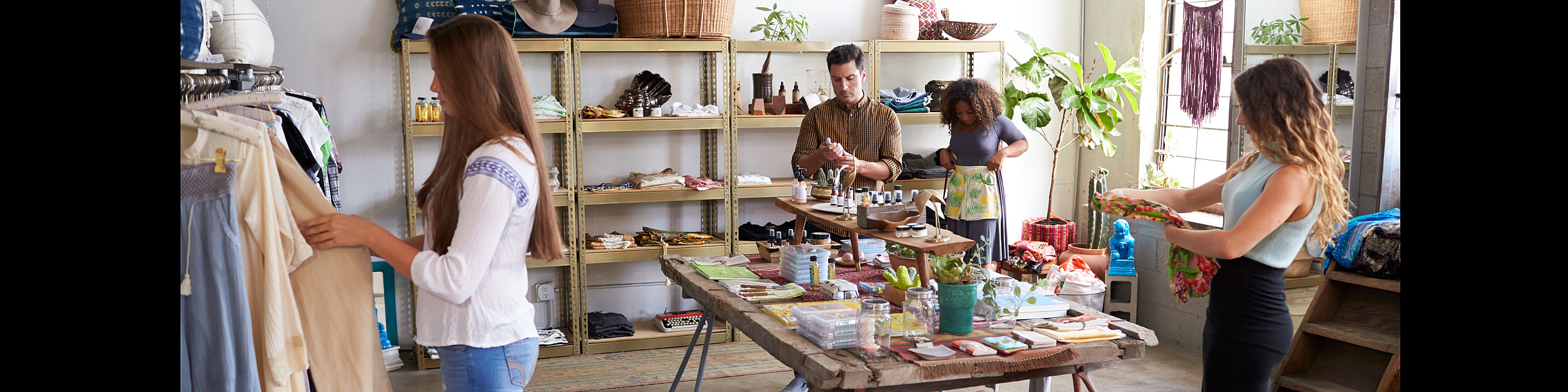 Charming boutique store with vibrant decor and customers browsing unique handcrafted items.