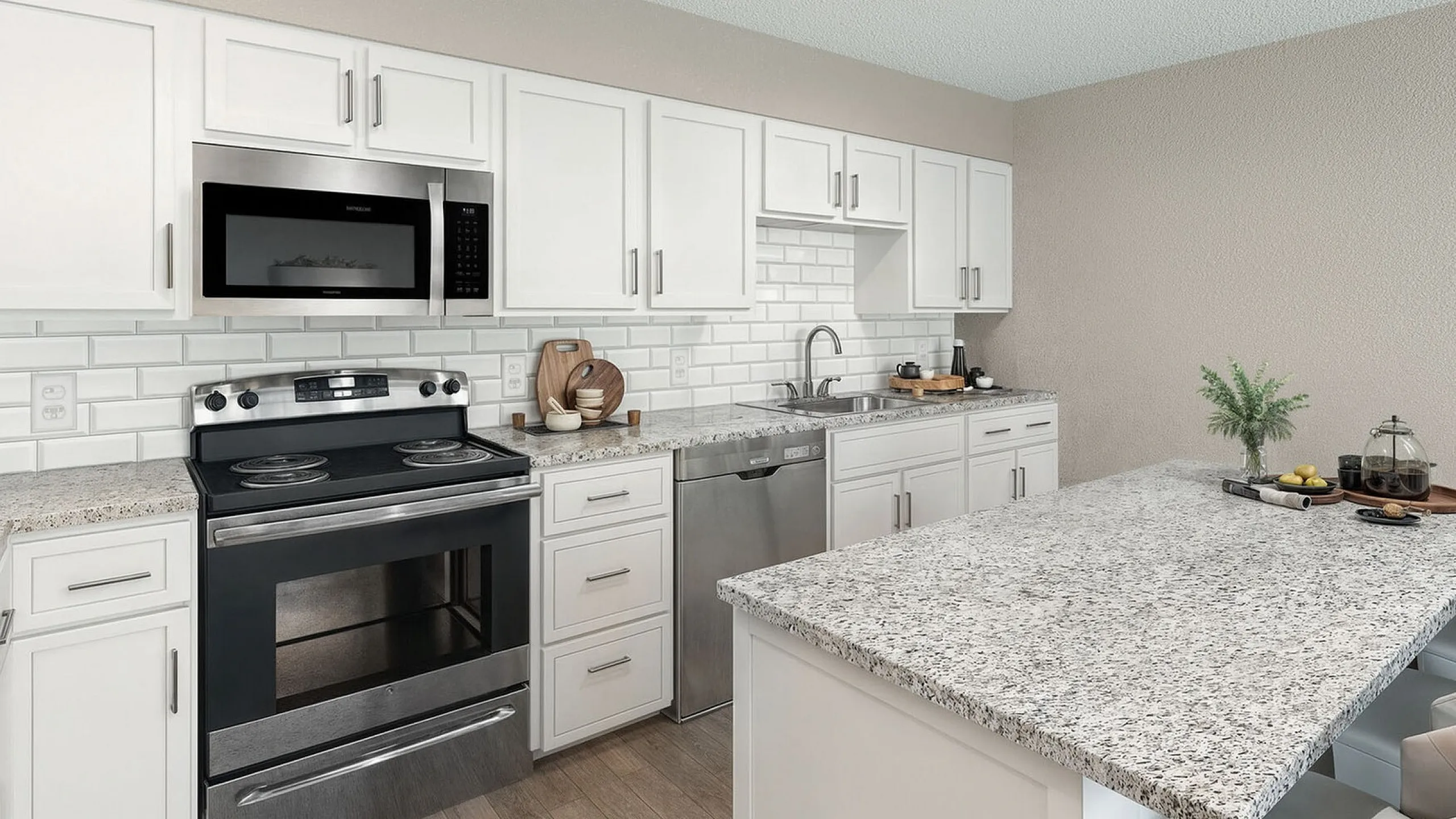 Modern kitchen with elegant granite countertops, white cabinetry, and stainless steel appliances, perfect for contemporary living.