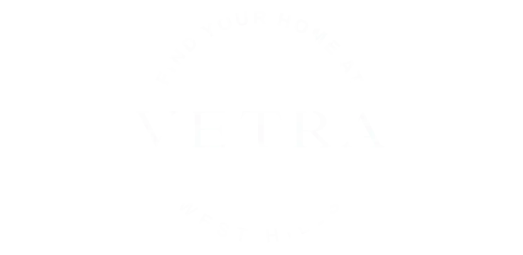 Elegant circular logo of VETRA West Hills with the inviting phrase 'Find Your Home At' encircling the brand name.