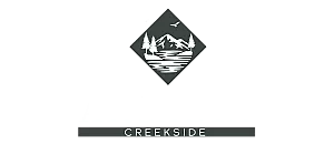 Mountainous logo for Arcadia Creekside, showcasing serene nature with trees, a river, and birds, embodying tranquility and scenic beauty.