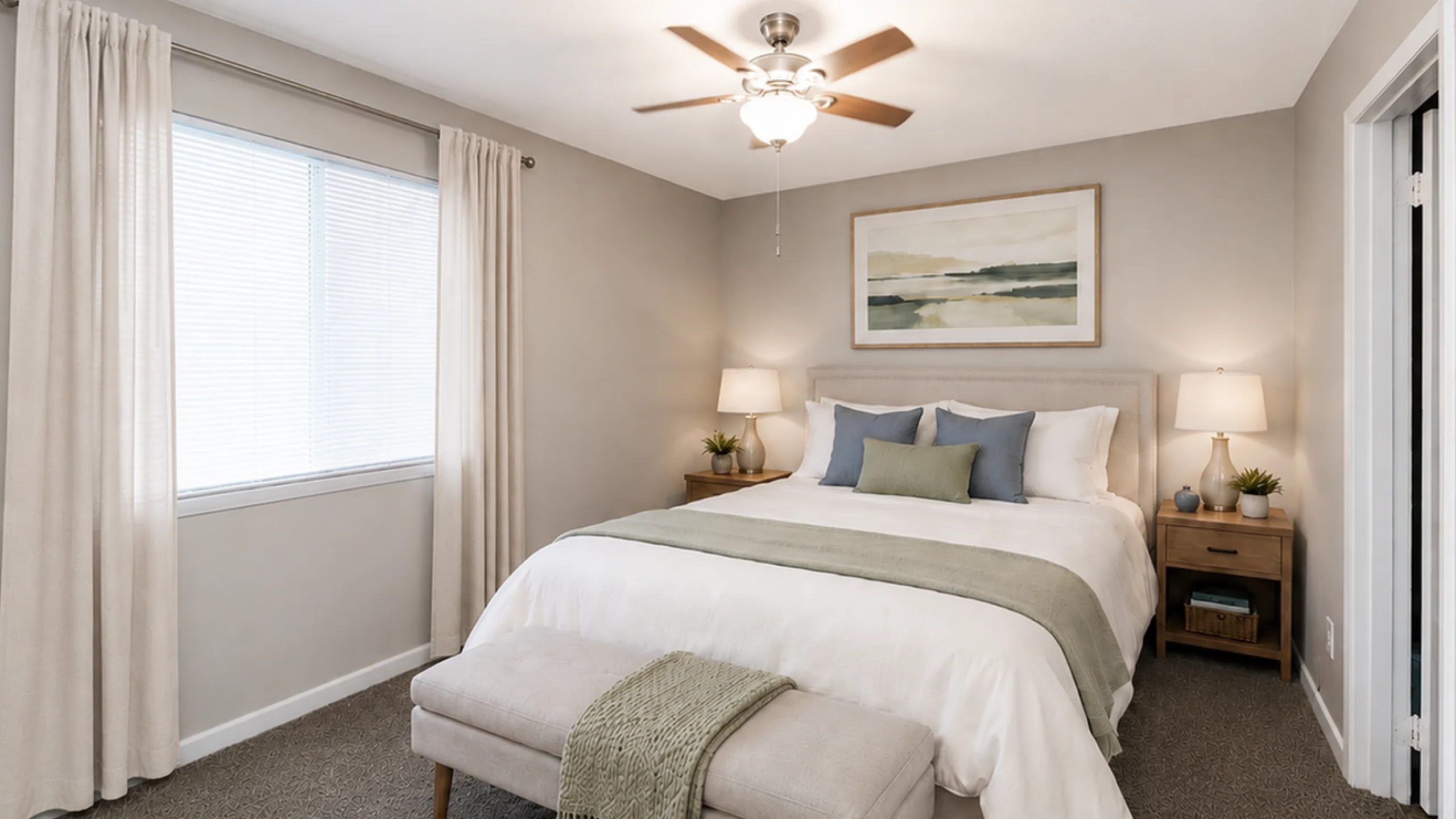 Inviting and serene bedroom featuring a plush king-sized bed with a stylish headboard, complemented by soft lighting and modern decor.