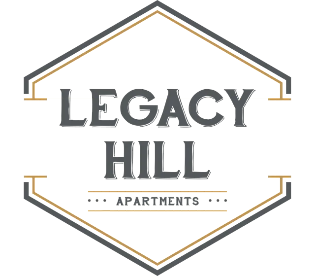 Elegant Legacy Hill Apartments logo with modern geometric design and bold lettering.