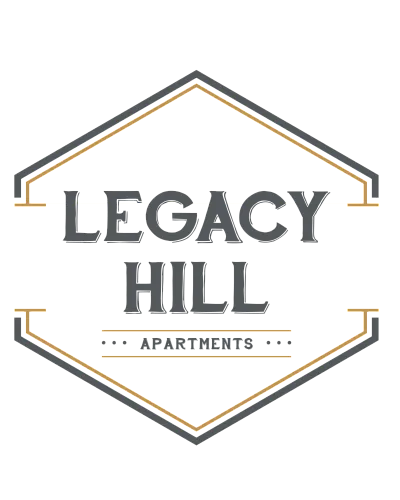 Elegant logo of Legacy Hill Apartments featuring a sophisticated hexagonal design with bold typography.