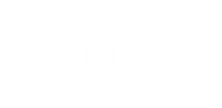 Elegant circular logo with 'Find Your Home at Vetra Belle Meade' in white font on a black background.