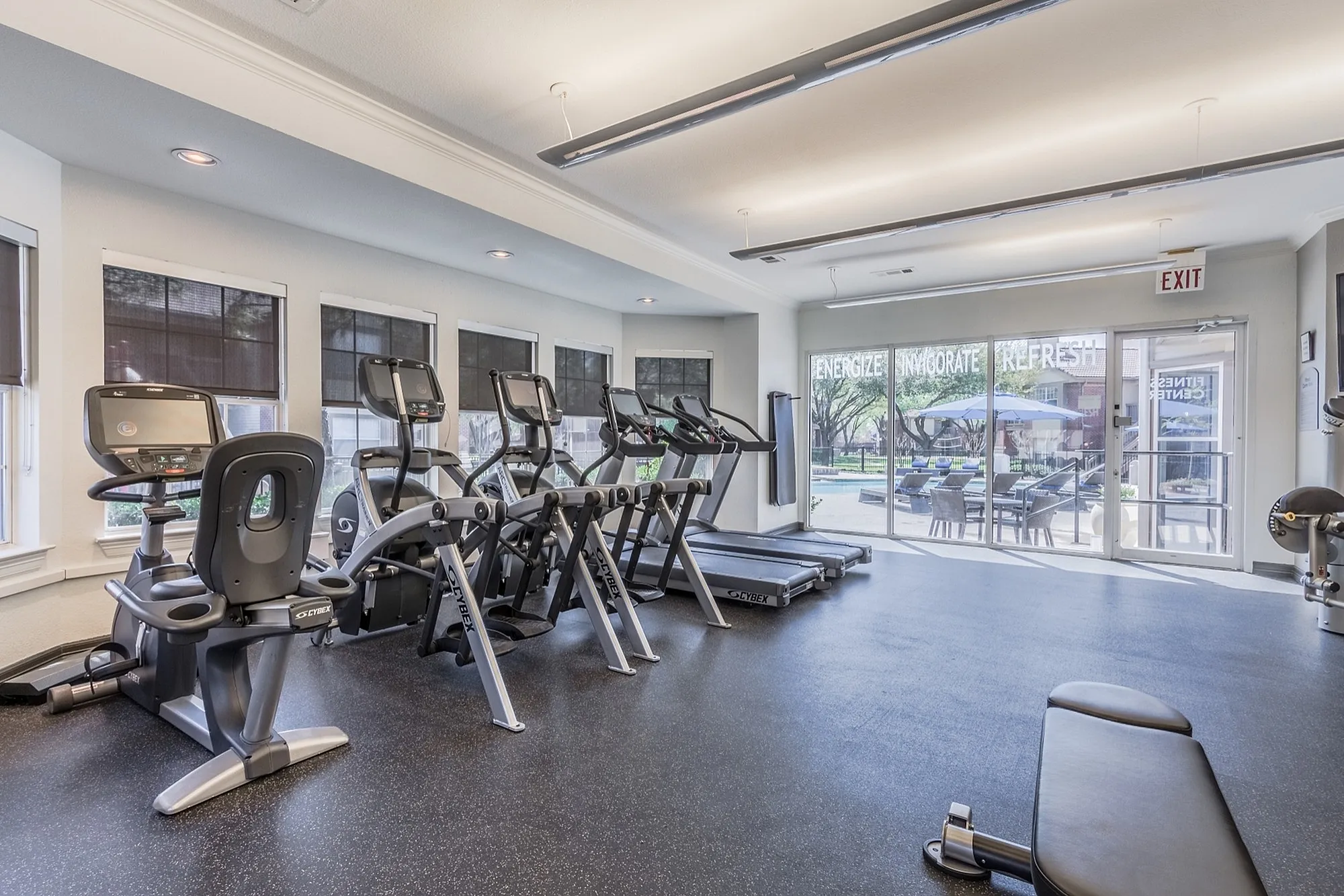 Modern fitness center with state-of-the-art exercise equipment and a bright, inviting atmosphere.