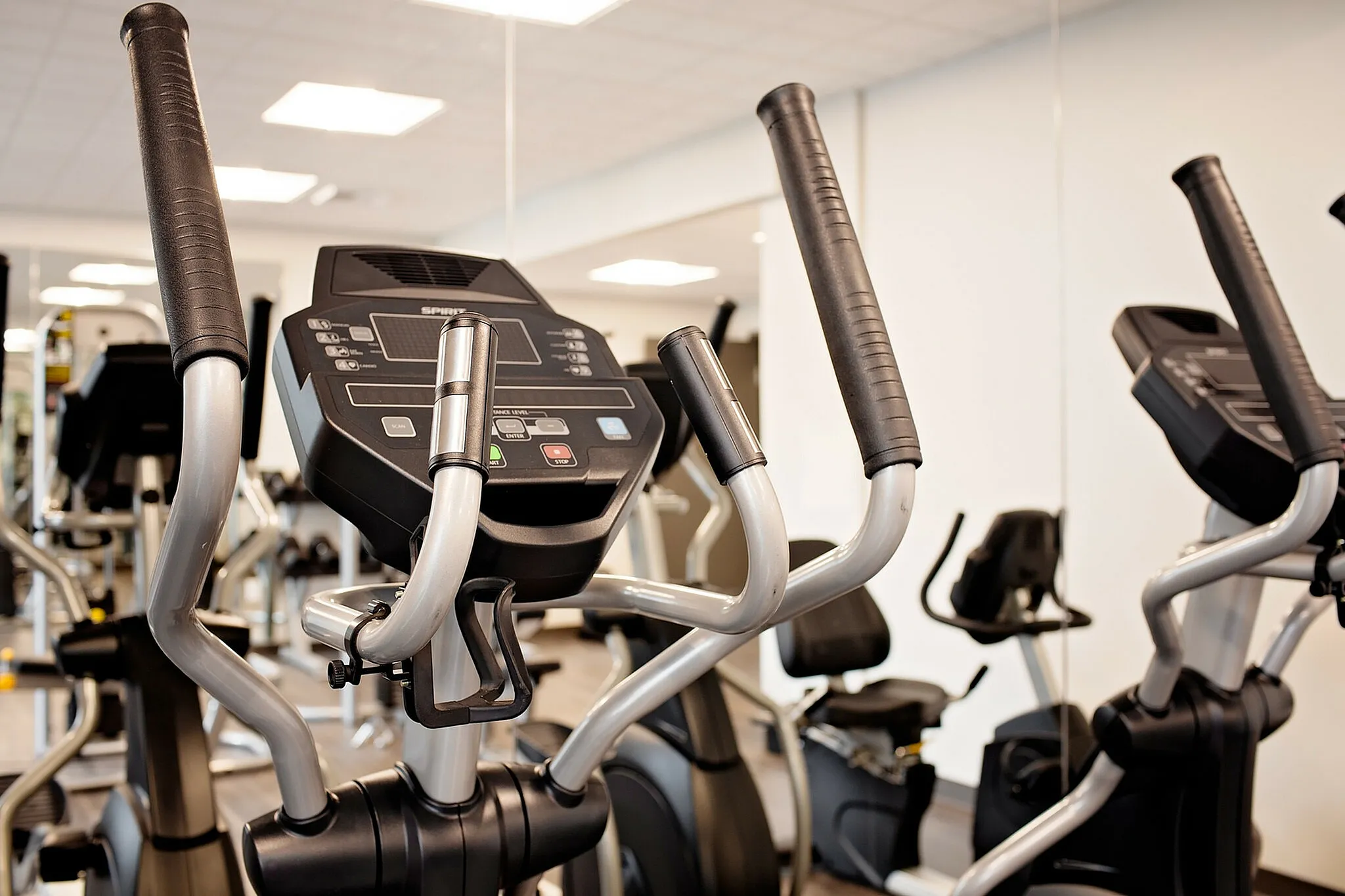 Modern fitness center equipped with state-of-the-art exercise bikes, offering a premium workout experience.