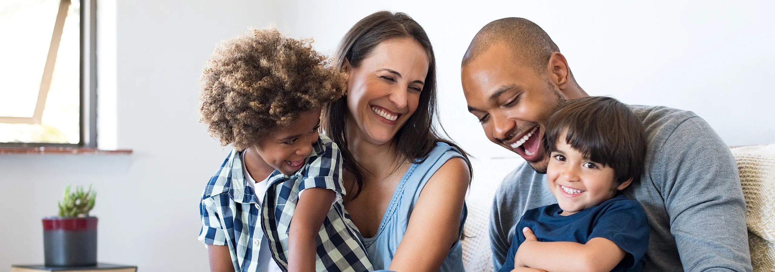 Family sitting on couch