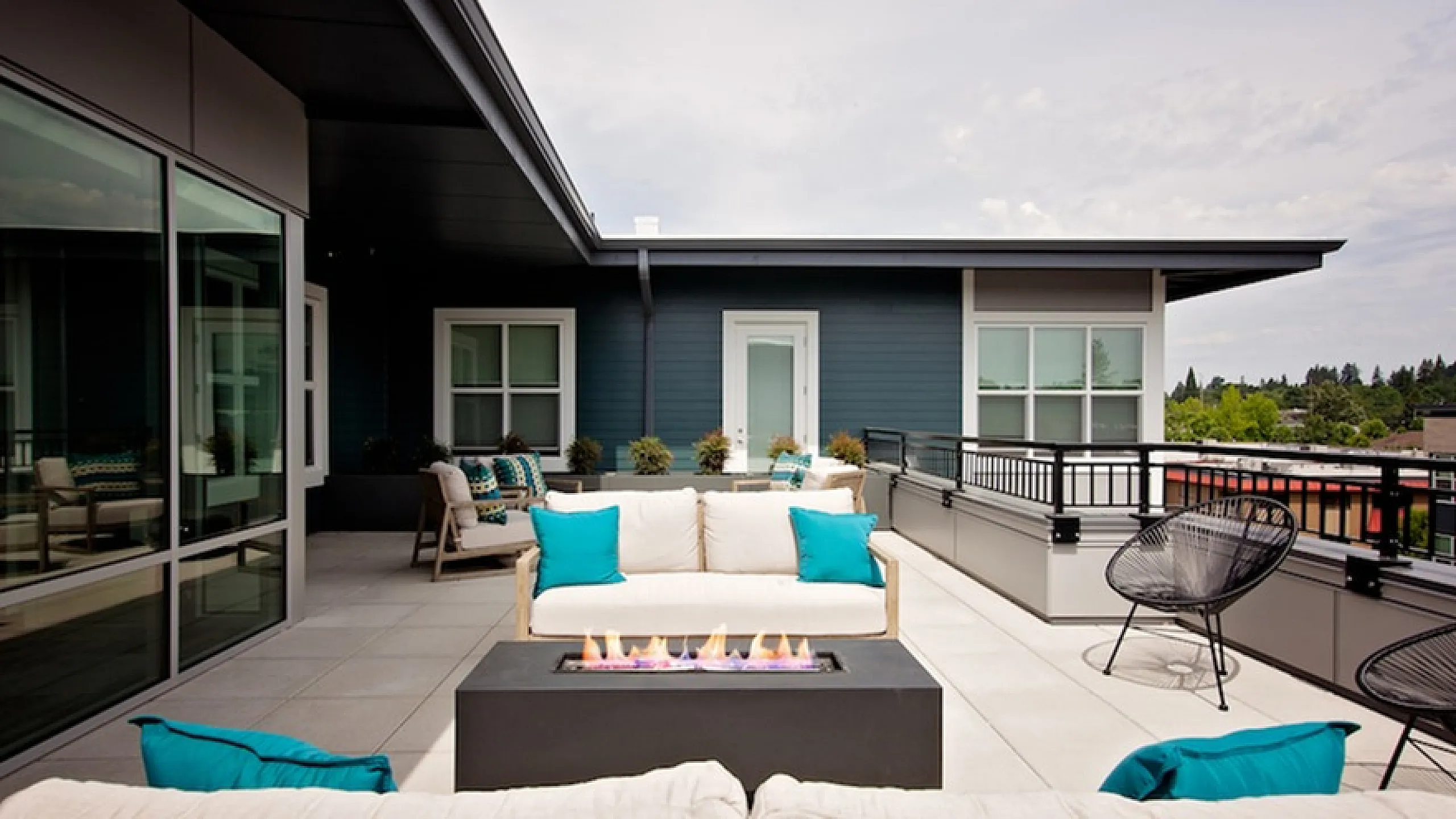 Modern, cozy living space with sleek kitchen, inviting seating area, and stylish d&eacute;cor elements.