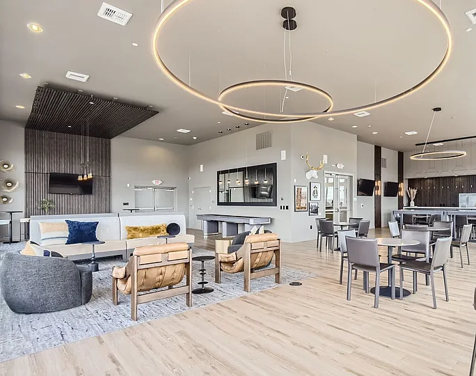 Elegant sky lounge at Elevation @ County Line Station with vibrant flowers and modern architecture in a serene location on South Valley Highway.