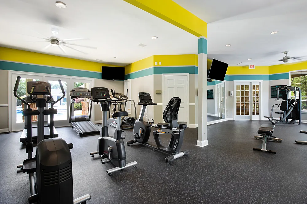 A fitness center with fitness equipment at The Madison apartments in Charlotte, NC.