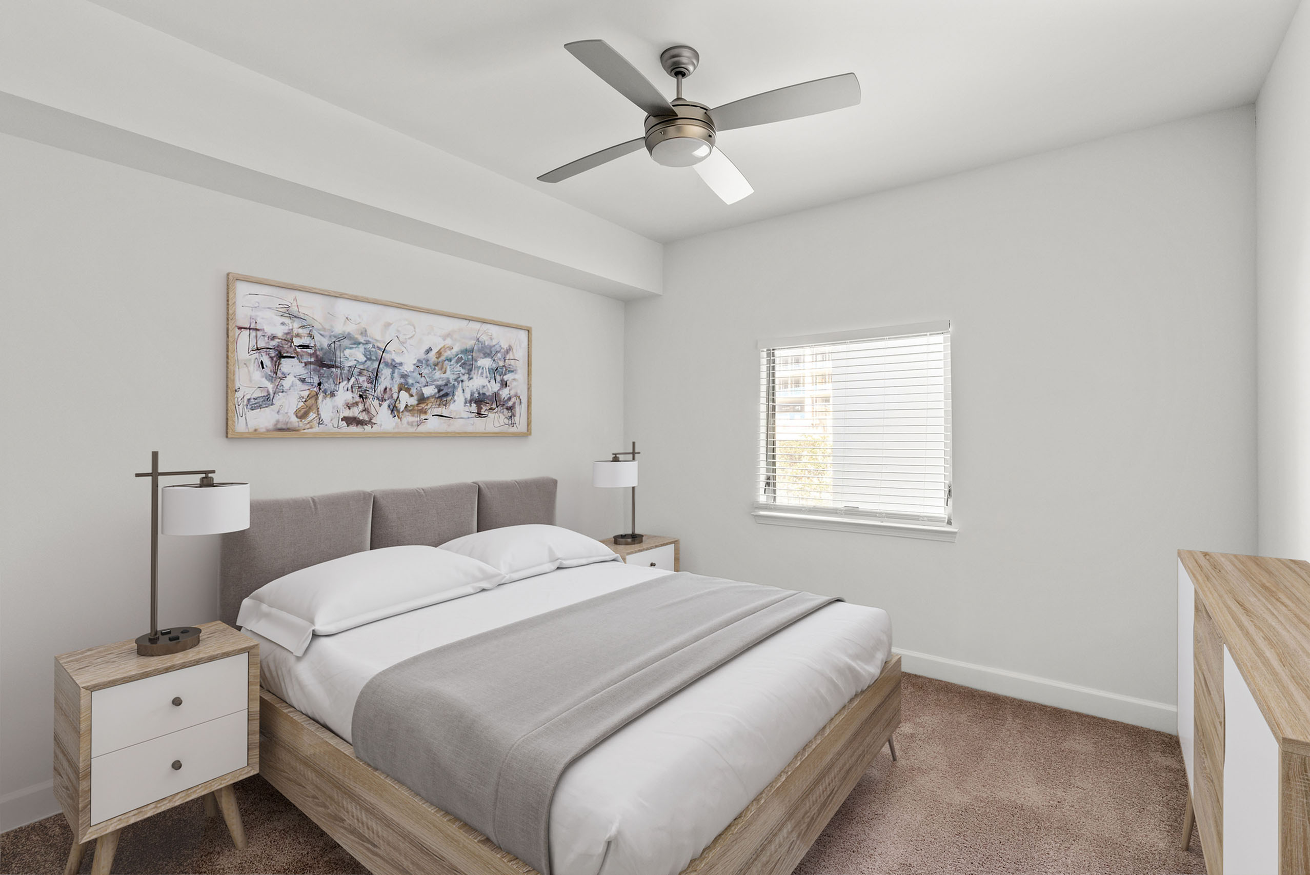 Bright and inviting bedroom with elegant artwork, featuring a modern ceiling fan and large window offering natural light.