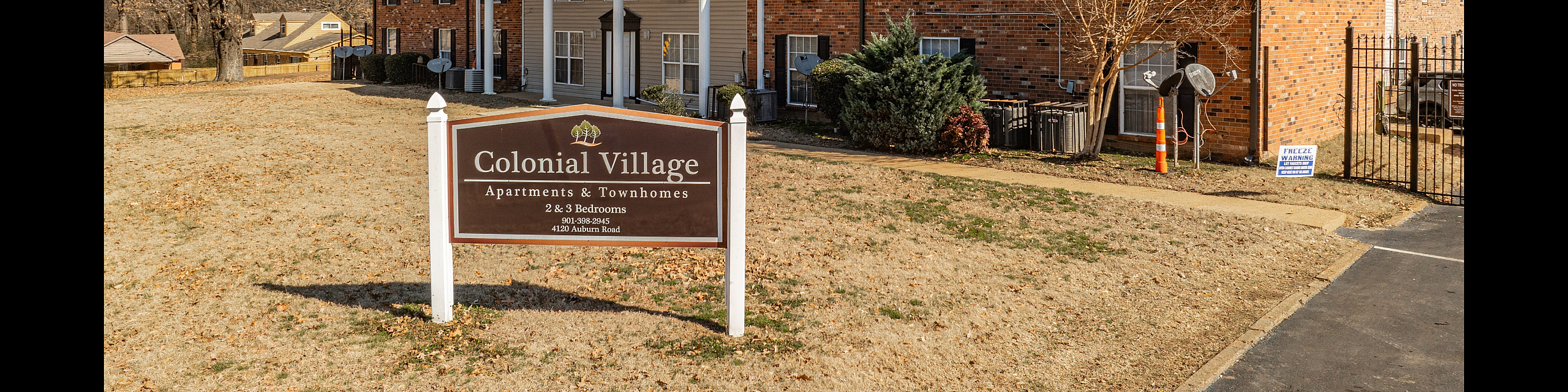 Colonial Village Apartments - Entrance Sign