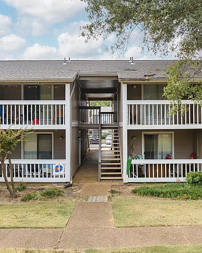 Two-story building with balconies at Deerfield Apartments in Memphis, TN