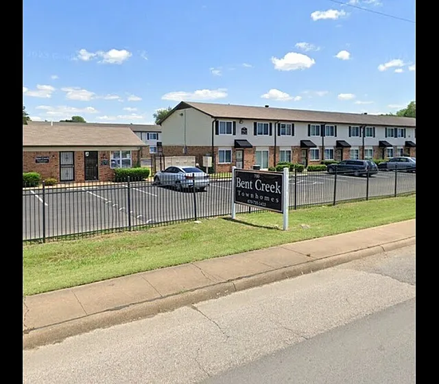 Front sign along the gated entrance at Bent Creek Apartments in West Memphis, AR