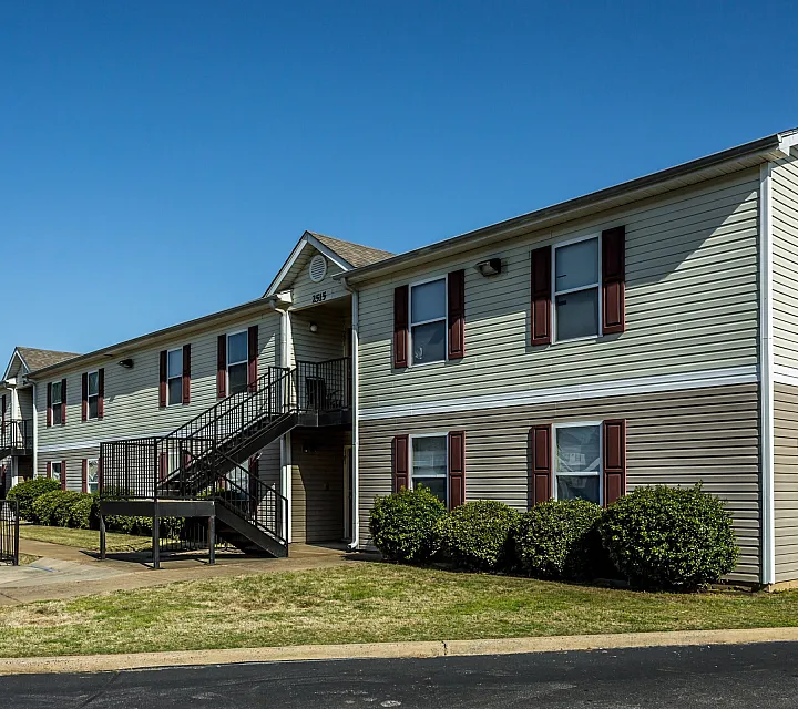 Apartment buildings with exterior stairways at Countryside Village in Memphis, TN