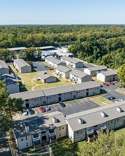 Aerial view of the community surrounded by trees at Hunter Oaks Apartments in Memphis, TN