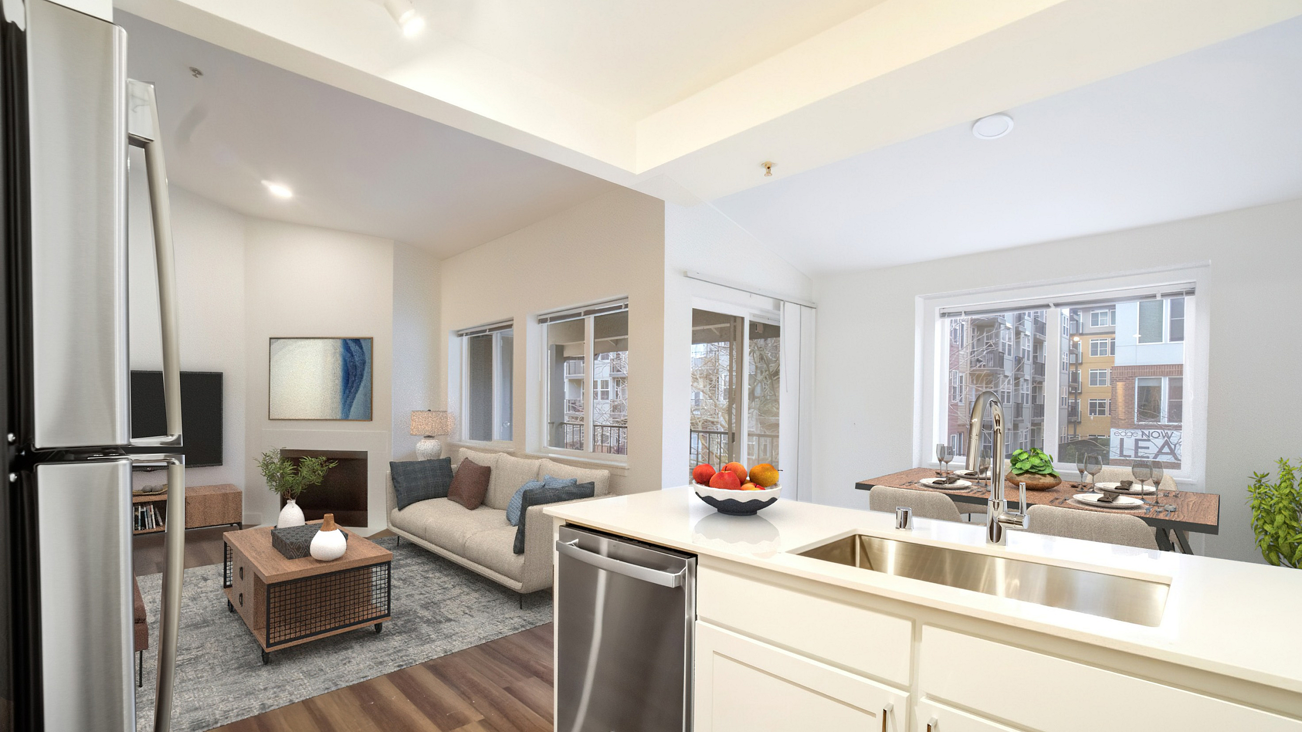 Chic open-concept apartment featuring a modern kitchen with stainless steel appliances, a cozy living room with stylish furnishings, and a bright dining area with large windows.