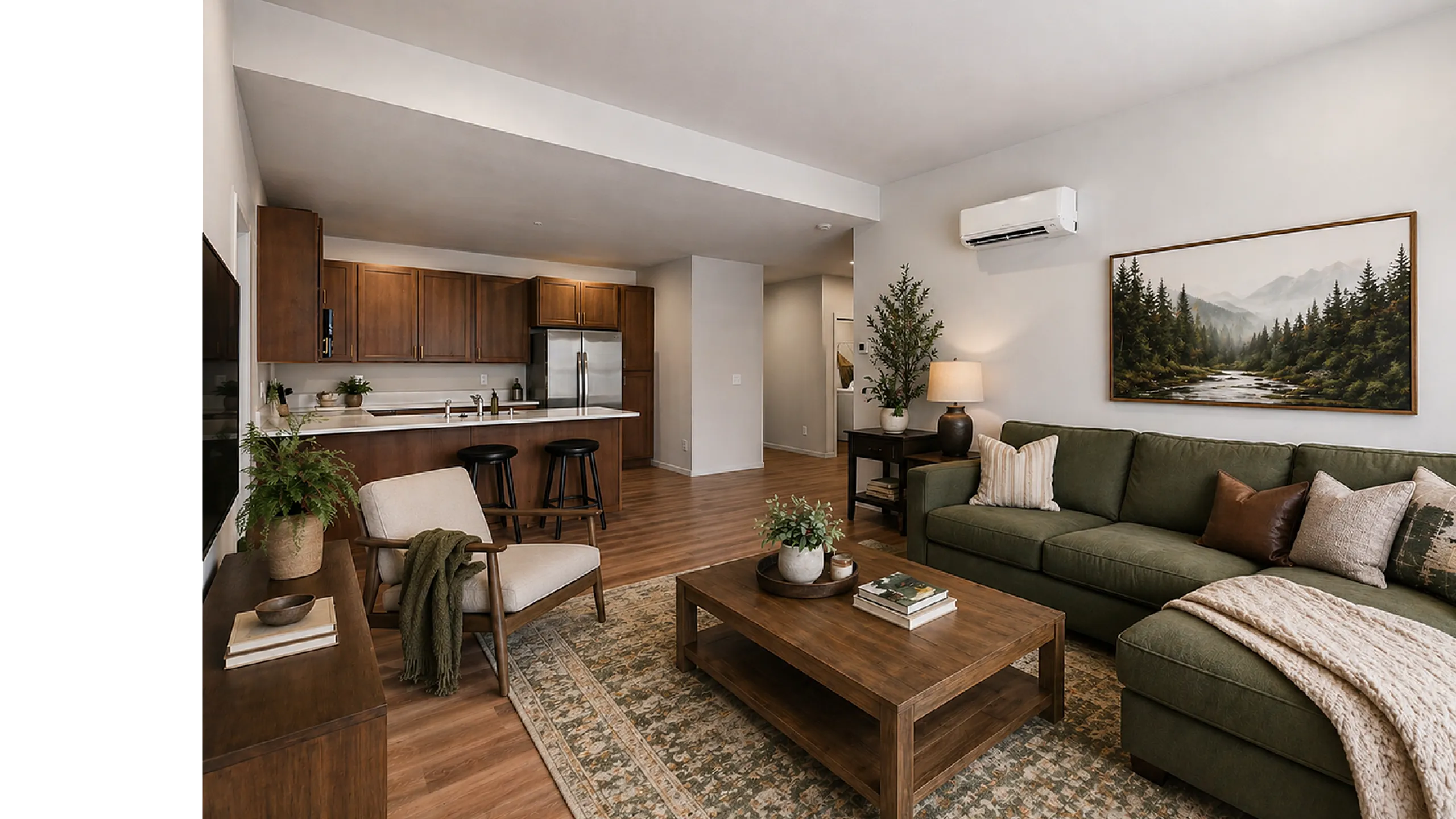 Elegant living room with a cozy green sofa, stylish wooden coffee table, and modern kitchen with bar seating, perfect for entertaining.