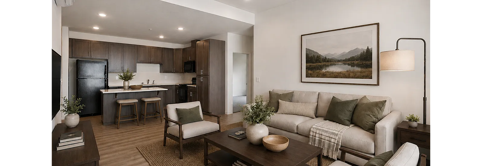 Inviting open-concept living room and kitchen with stylish wood cabinetry, modern appliances, and cozy seating area. Bright and elegant design with a touch of nature.