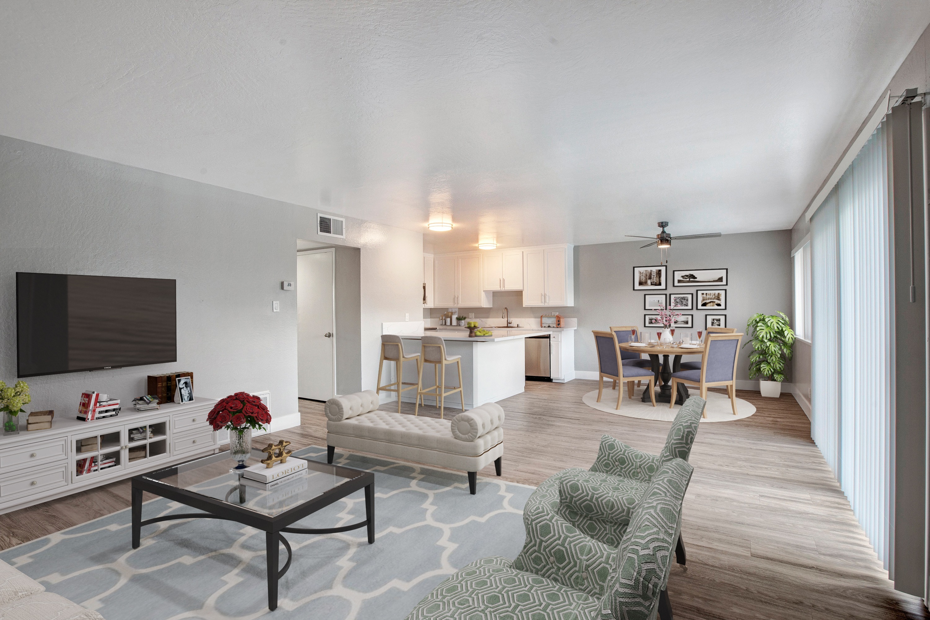 Renovated apartment with open concept floor plan and large windows