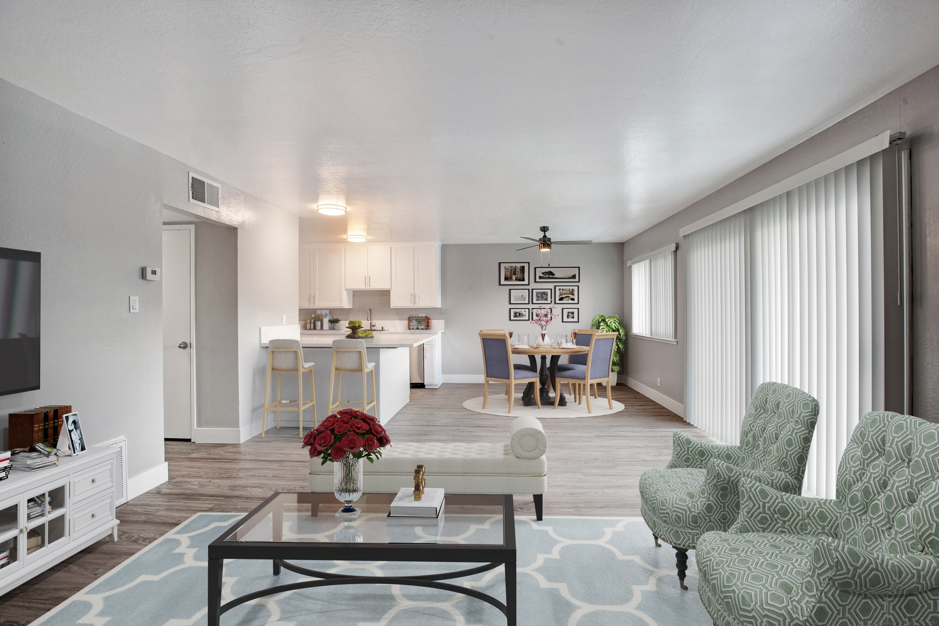 Renovated apartment with open concept floor plan and large windows