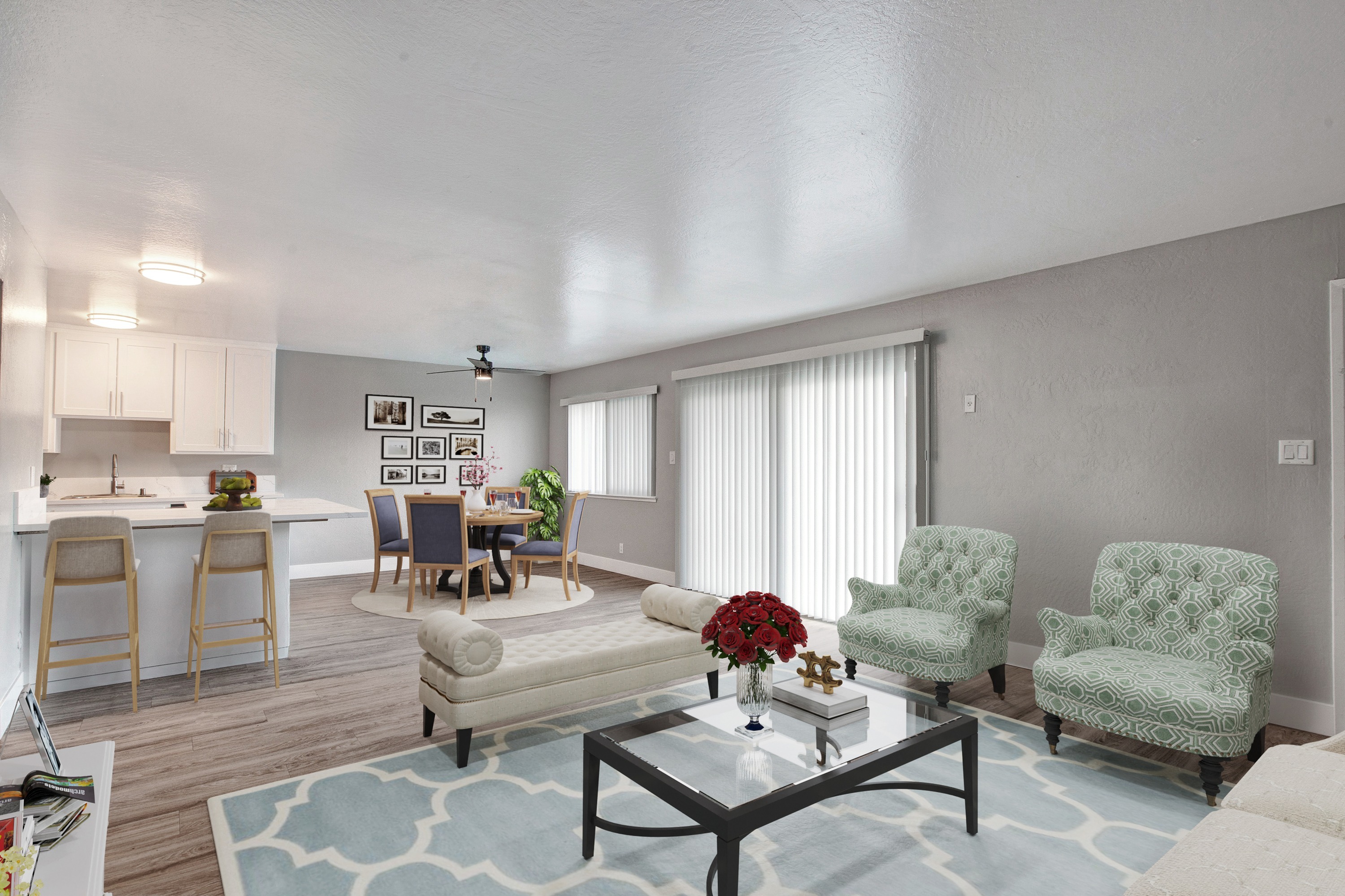 Renovated apartment with open concept floor plan and large windows