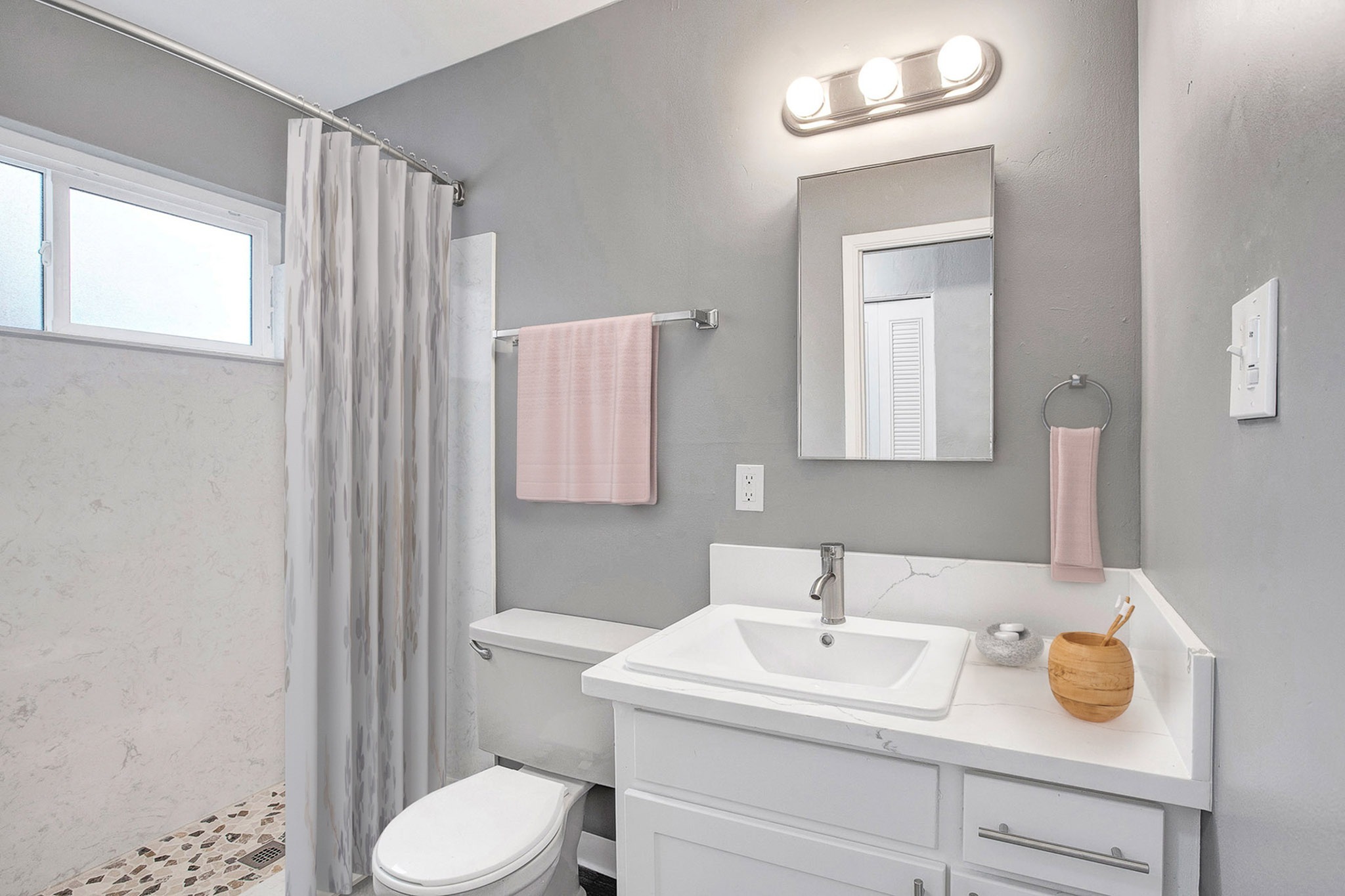 Renovated studio apartment bathroom