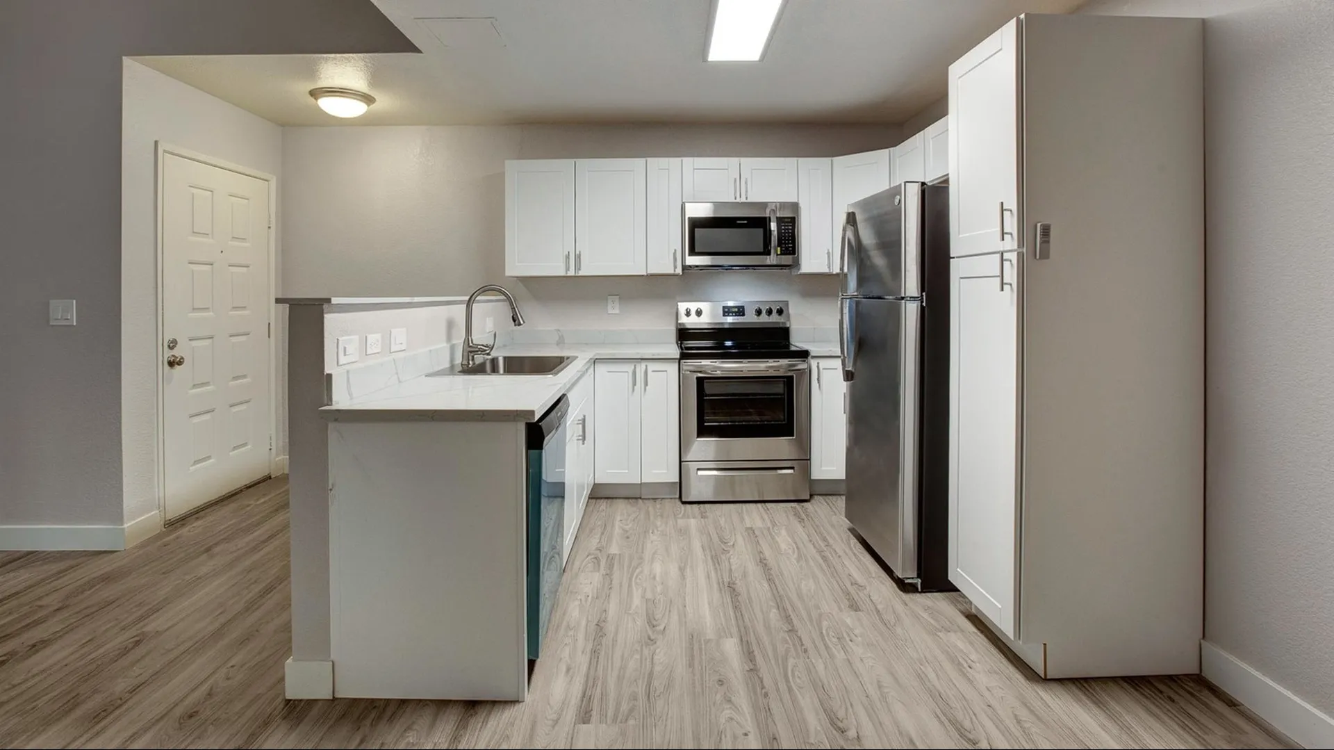 Renovated kitchen with stainless steel appliances