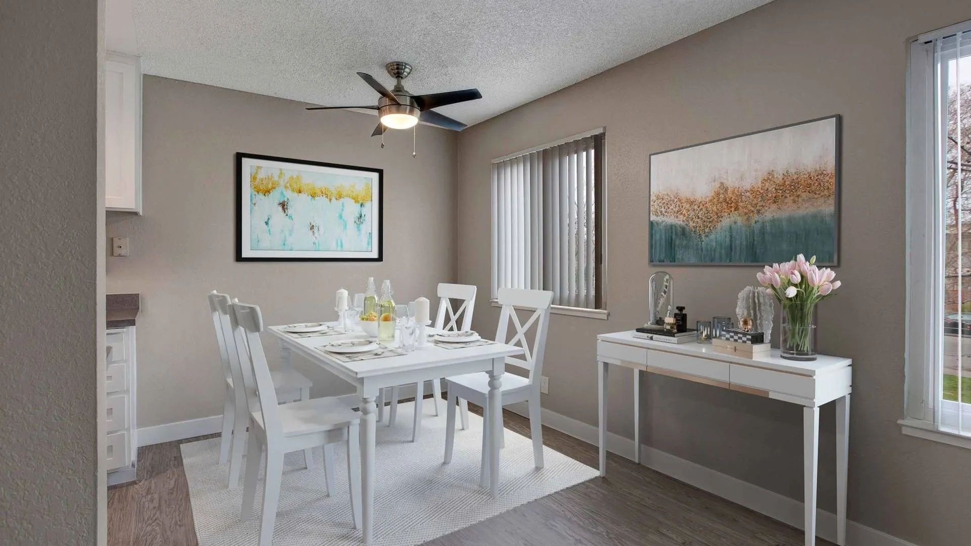 Dining area with windows and white furniture
