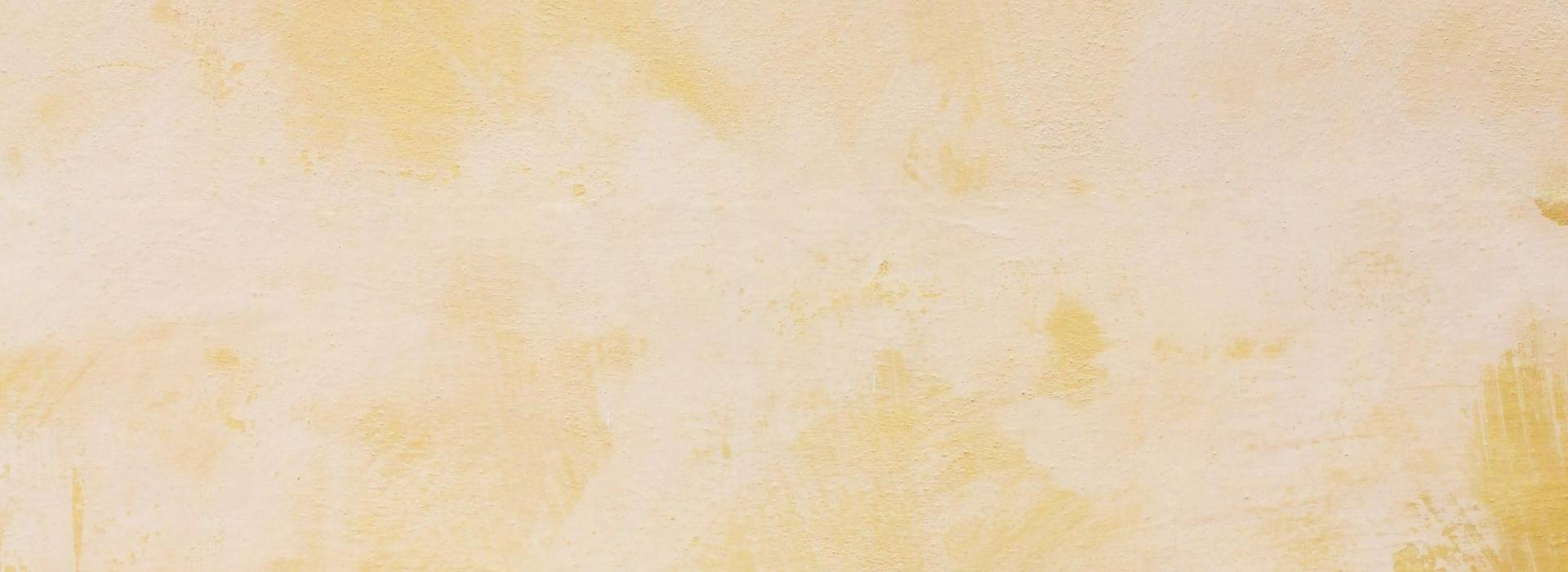 Pale yellow textured back round.