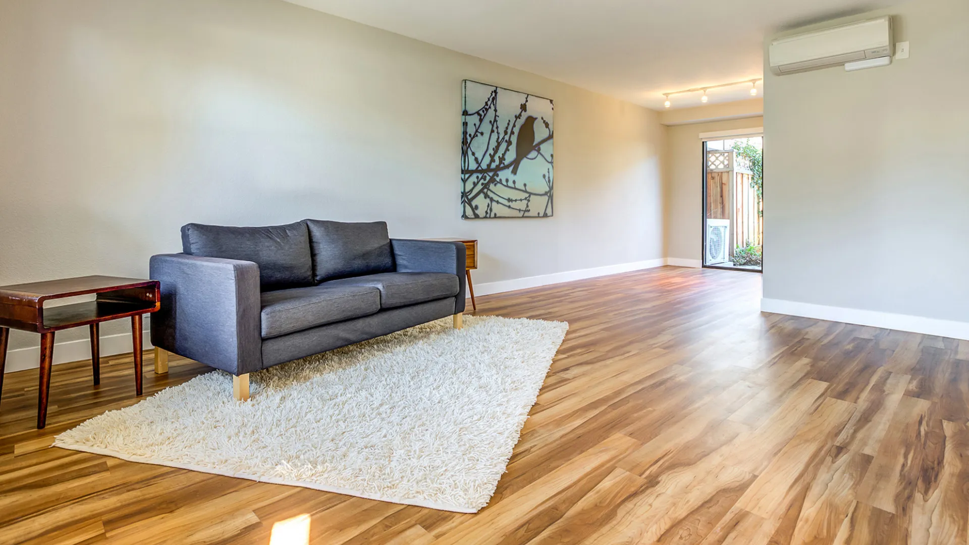 Living Room with couch and wood flooring