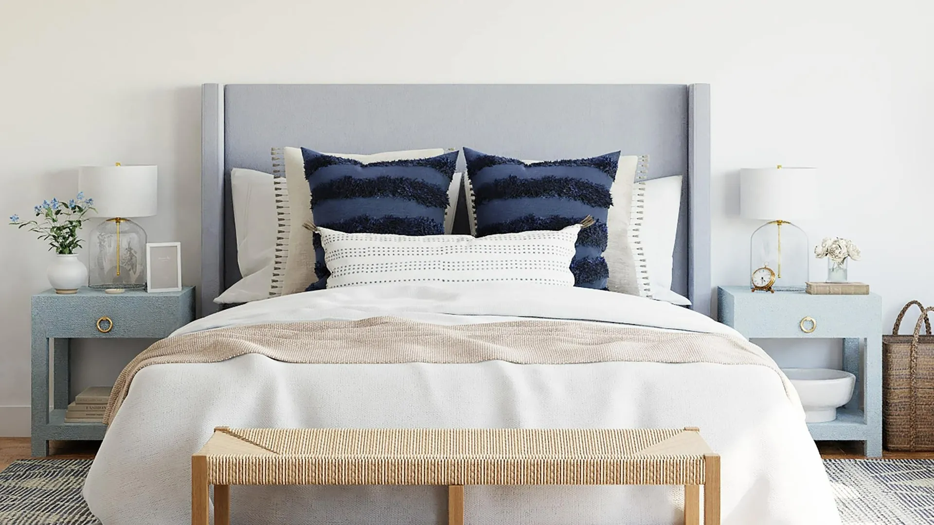 Bedroom with Queen bed and side tables, lamps, and other decor.