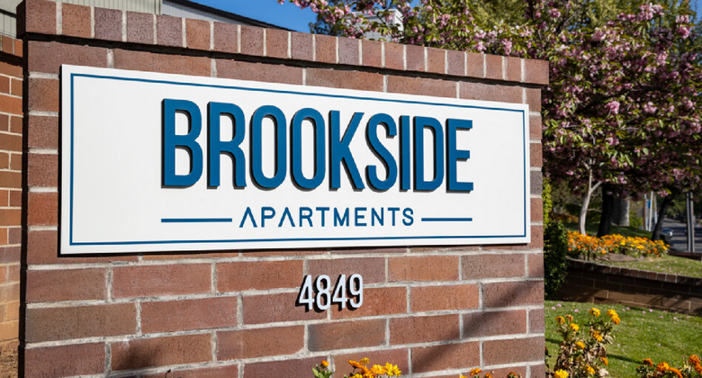Monument sign, saying "Brookside Apartments, 4849"