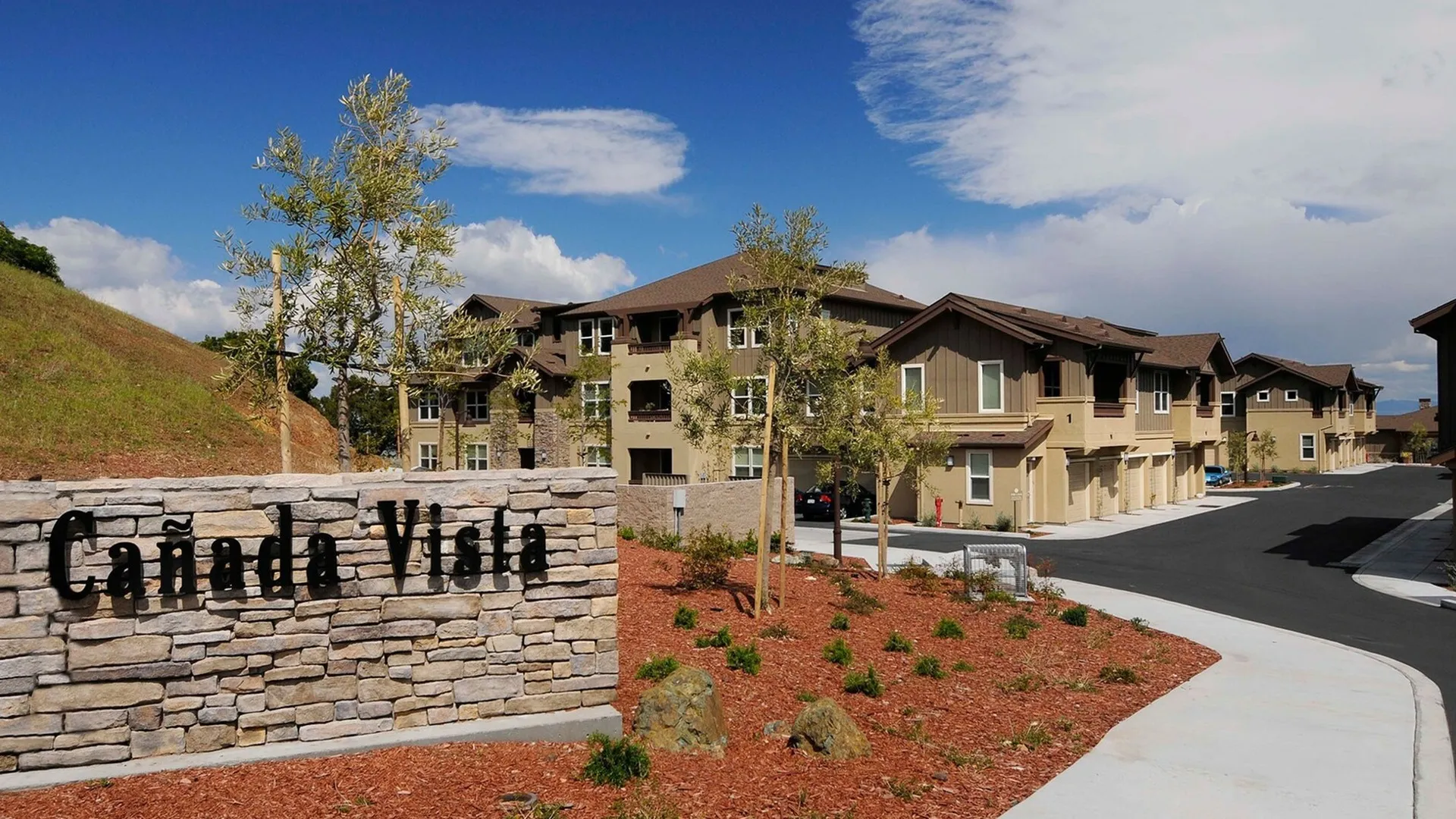 Canada Vista residential buildings with stone monument sign