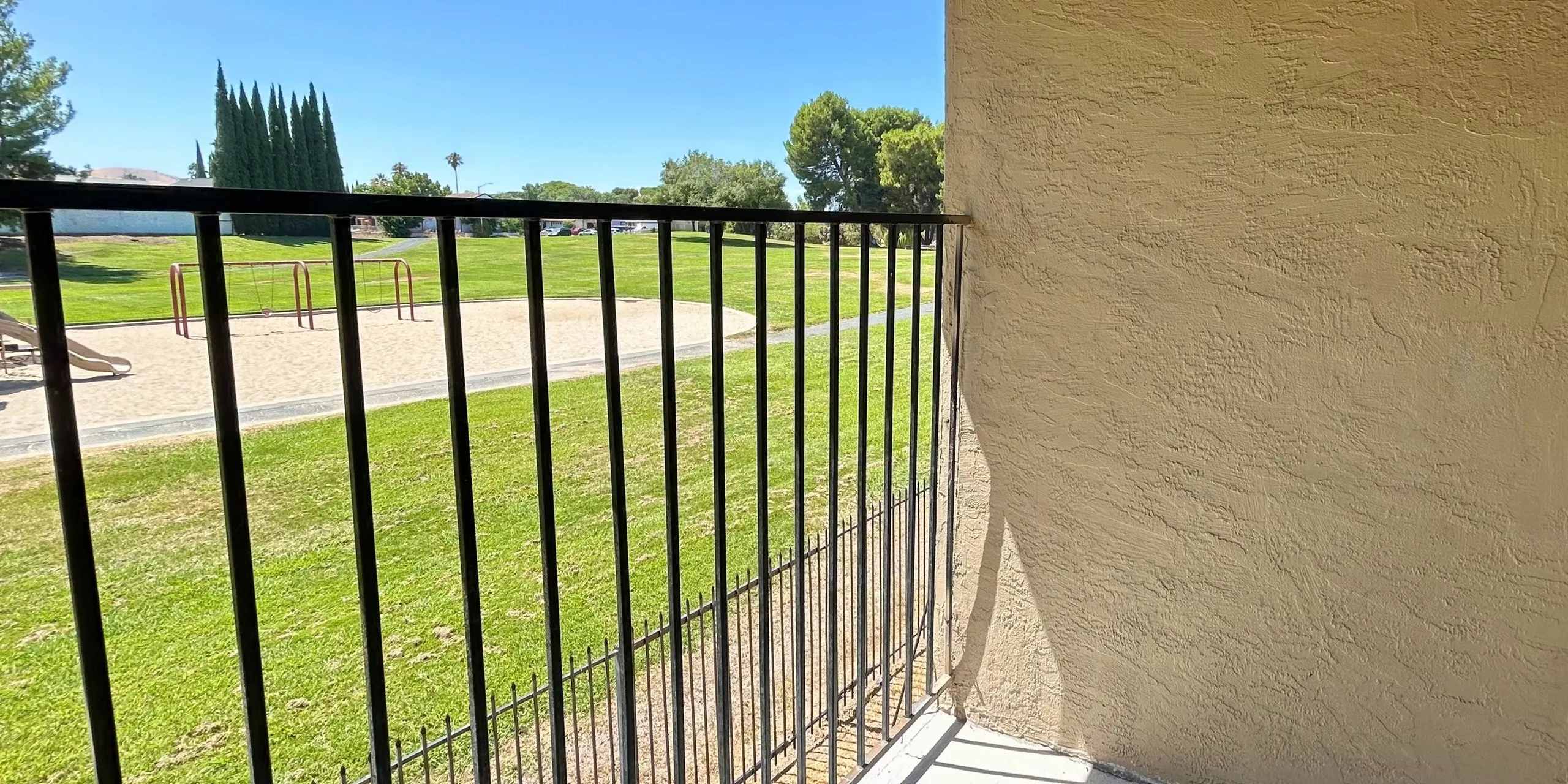 View from balcony overlooking the playground at Parkview Village Apartments