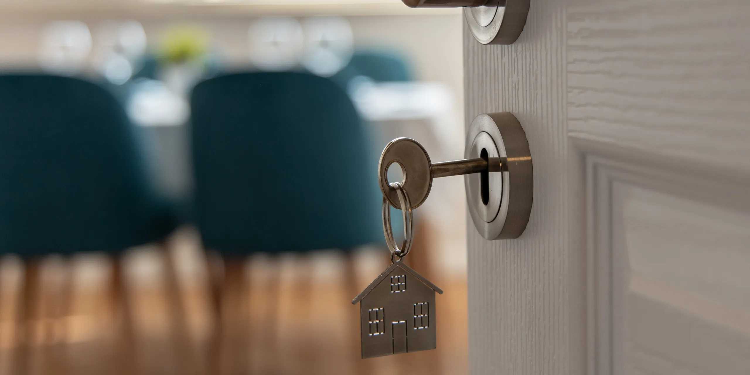 key in a lock with a door keychain