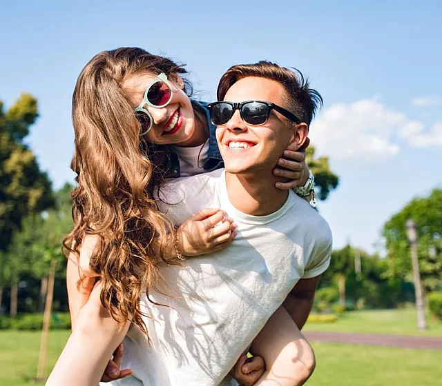 young couple in sunglasses