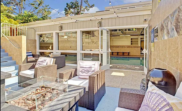 Lounge area at the property with lots of comfortable seating and a fireplace.