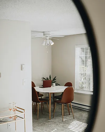 Mirror reflection of a small dinning corner