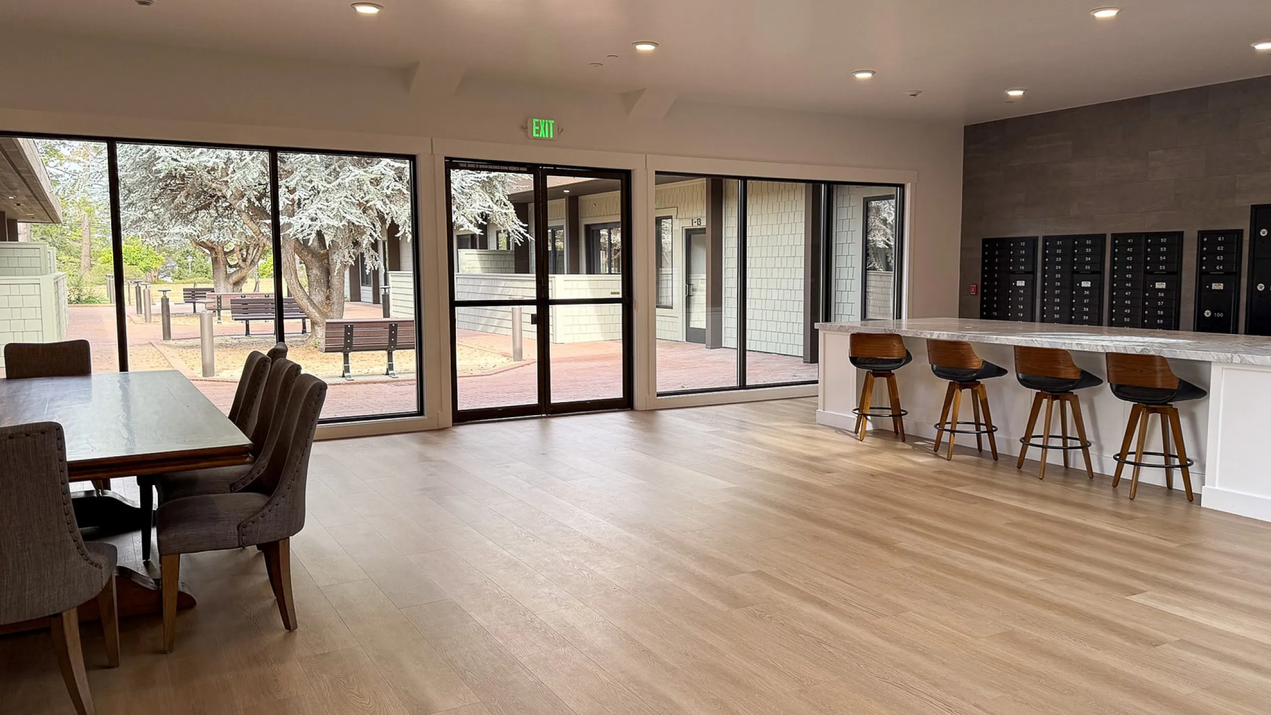 Lobby area with mailboxes and large communal table