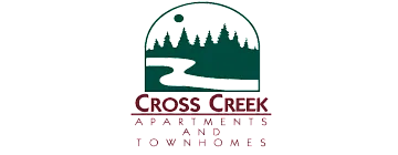 Logo for Cross Creek Apartments and Townhomes illustrating a scenic forest and river.