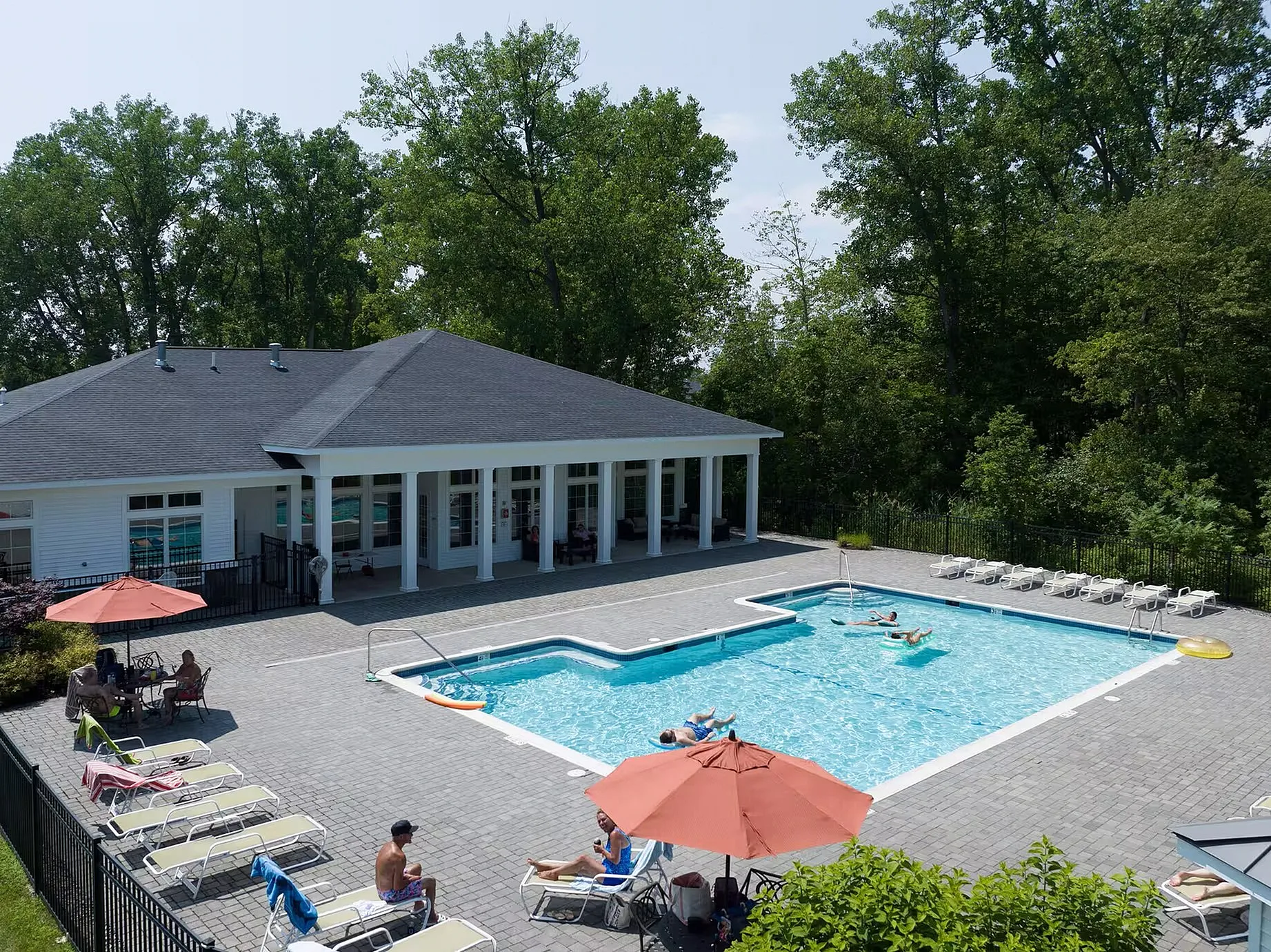 Elevated view of people enjoying the Kensington private pool
