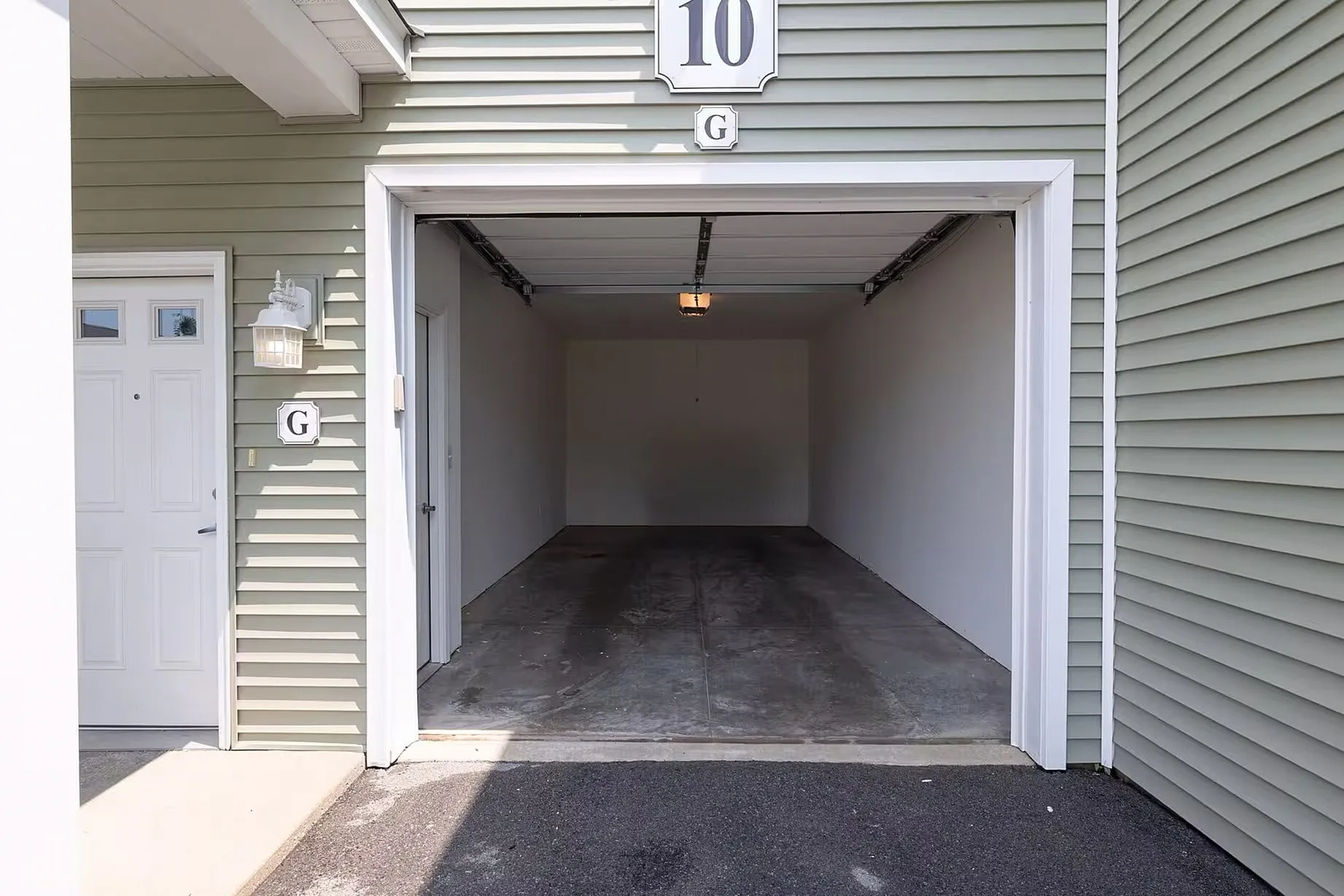 Inviting single-car garage with clean interiors and modern design, perfect for secure and convenient parking.