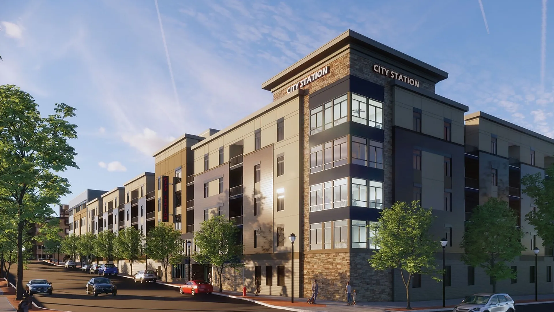 Modern urban apartment complex, City Station, showcasing sleek architecture and vibrant city living with lush trees and bustling street views.