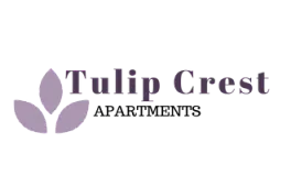 Elegant Tulip Crest logo design featuring a stylish tulip icon in soft mauve tones.