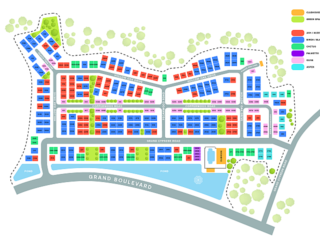 Colorful community map highlighting vibrant residential plots, green spaces, and a central clubhouse, set along Grand Boulevard and Grand Cypress Road.
