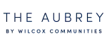 The Aubrey by Wilcox Communities elegant logo with modern typography, symbolizing luxury living and quality craftsmanship.