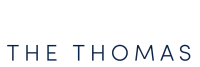 Elegant branding for The Thomas by Wilcox Communities, showcasing modern and stylish text design.