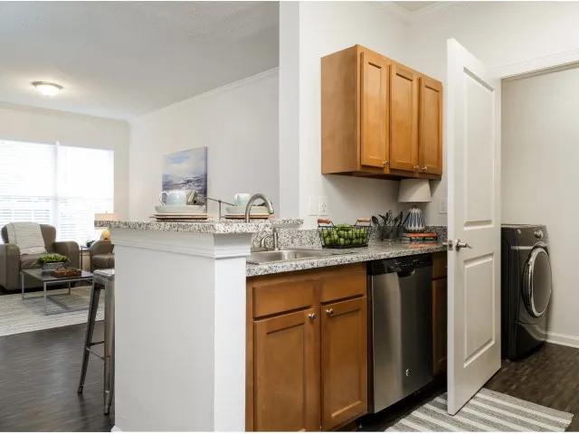 Upgraded Kitchen and Laundry Room with Full Size Washer & Dryer The Flatts Salisbury | Apartments In Salisbury, MD